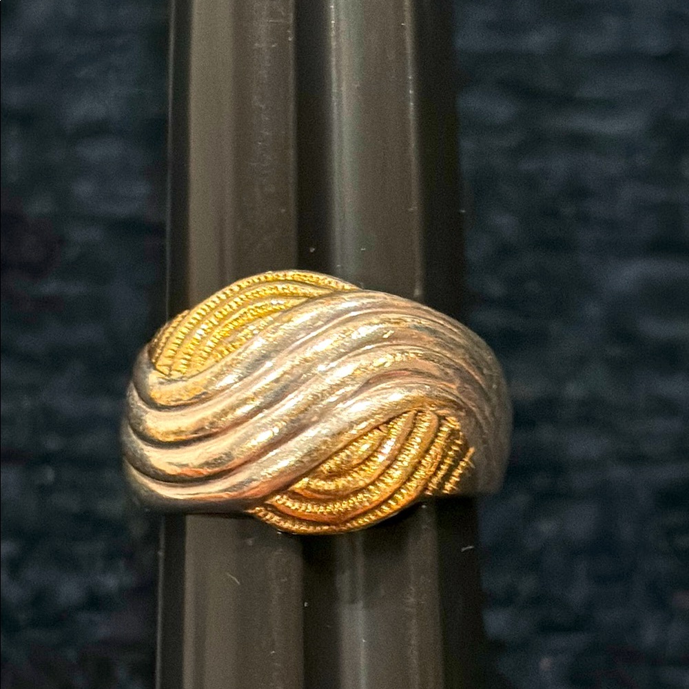 Sterling (925) silver ring with contrasting silver and gold swirl.